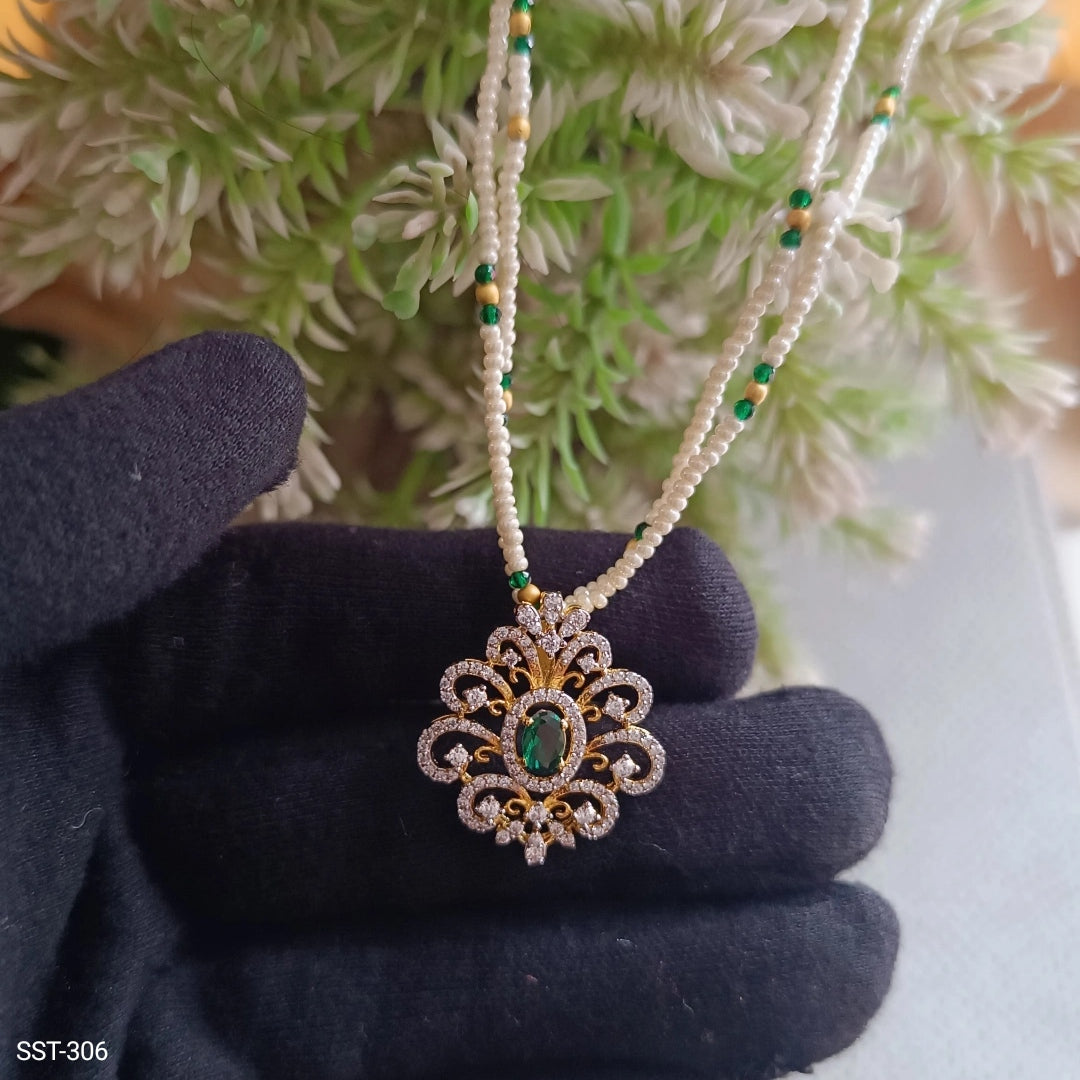 SST 306 | REGAL PEARL AND EMERALD MANGALSUTRA