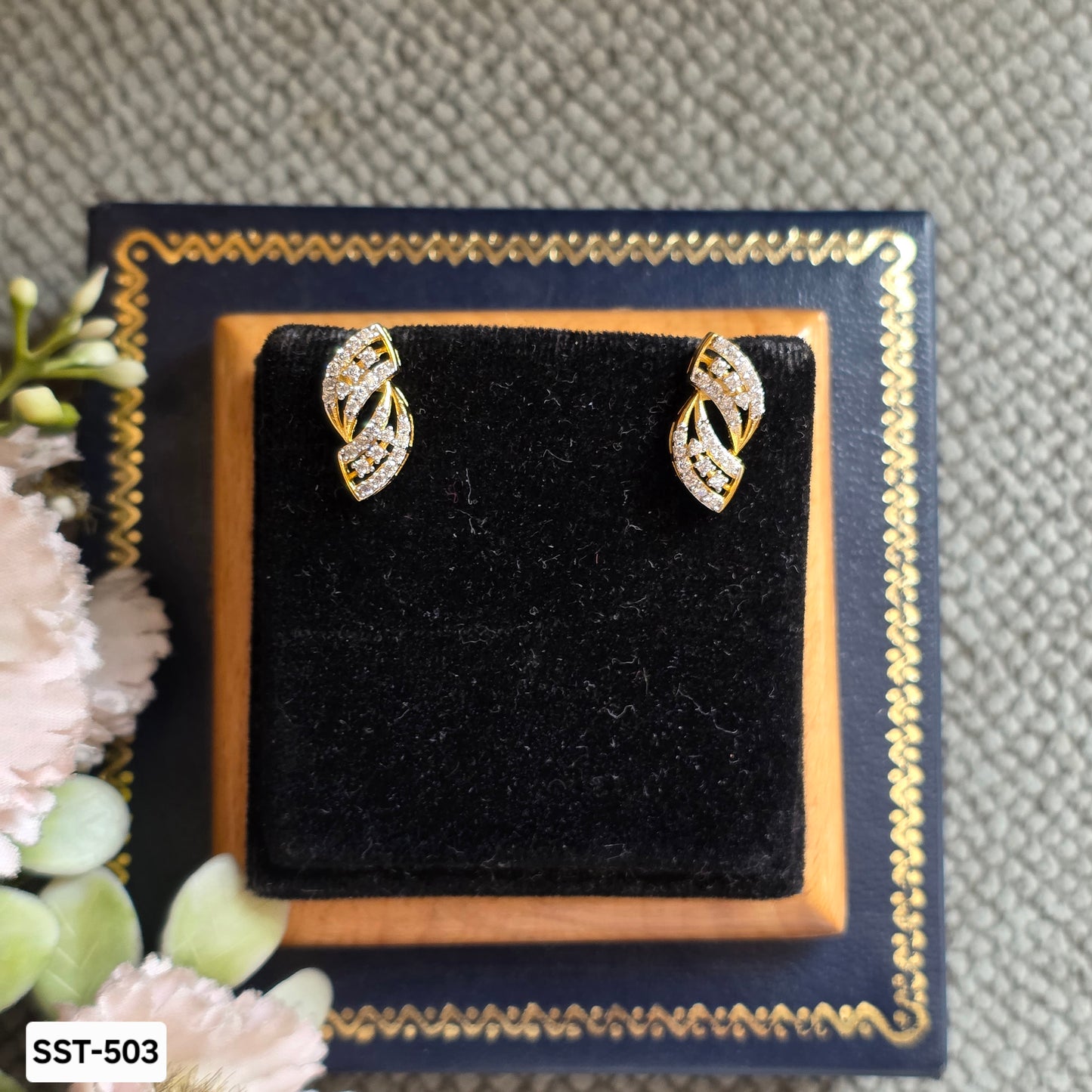 SST 503 | TWISTED LEAF STUD EARRINGS WITH DAZZLING STONES