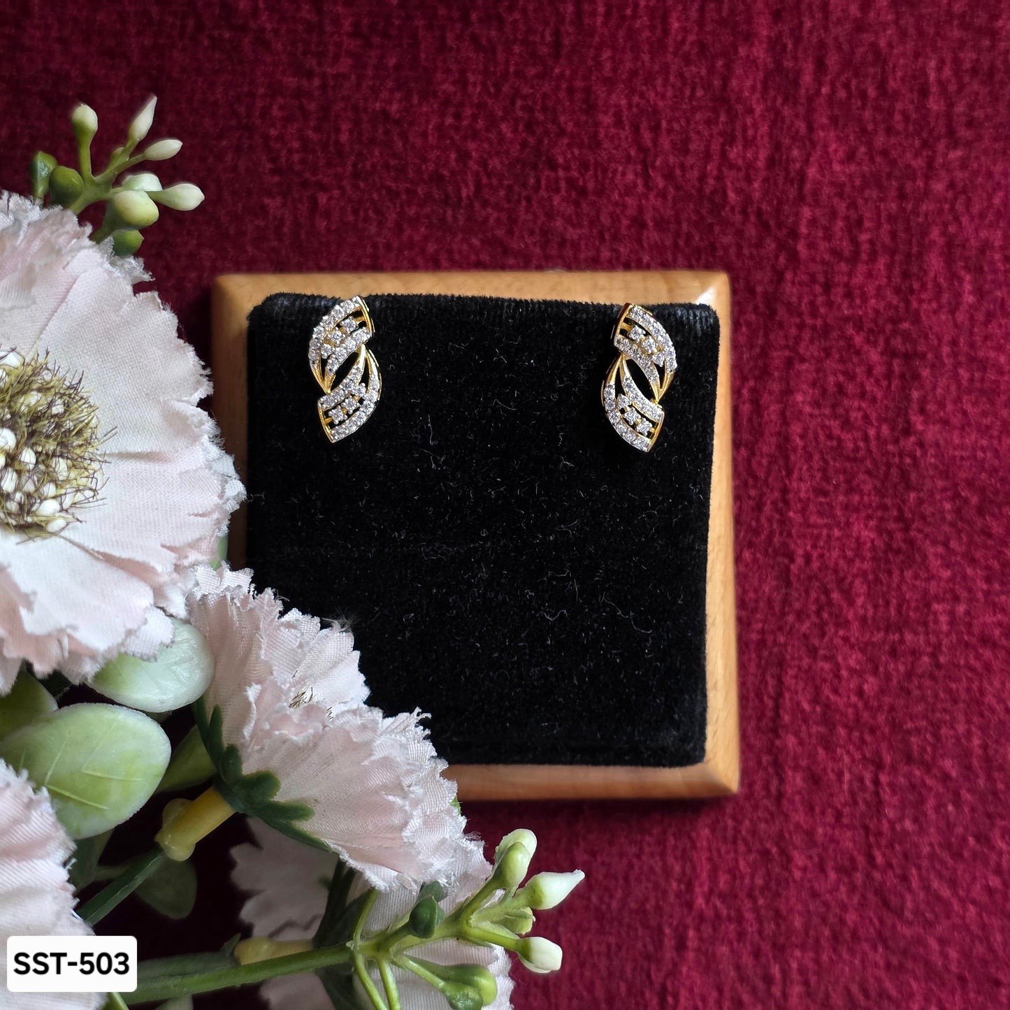 SST 503 | TWISTED LEAF STUD EARRINGS WITH DAZZLING STONES
