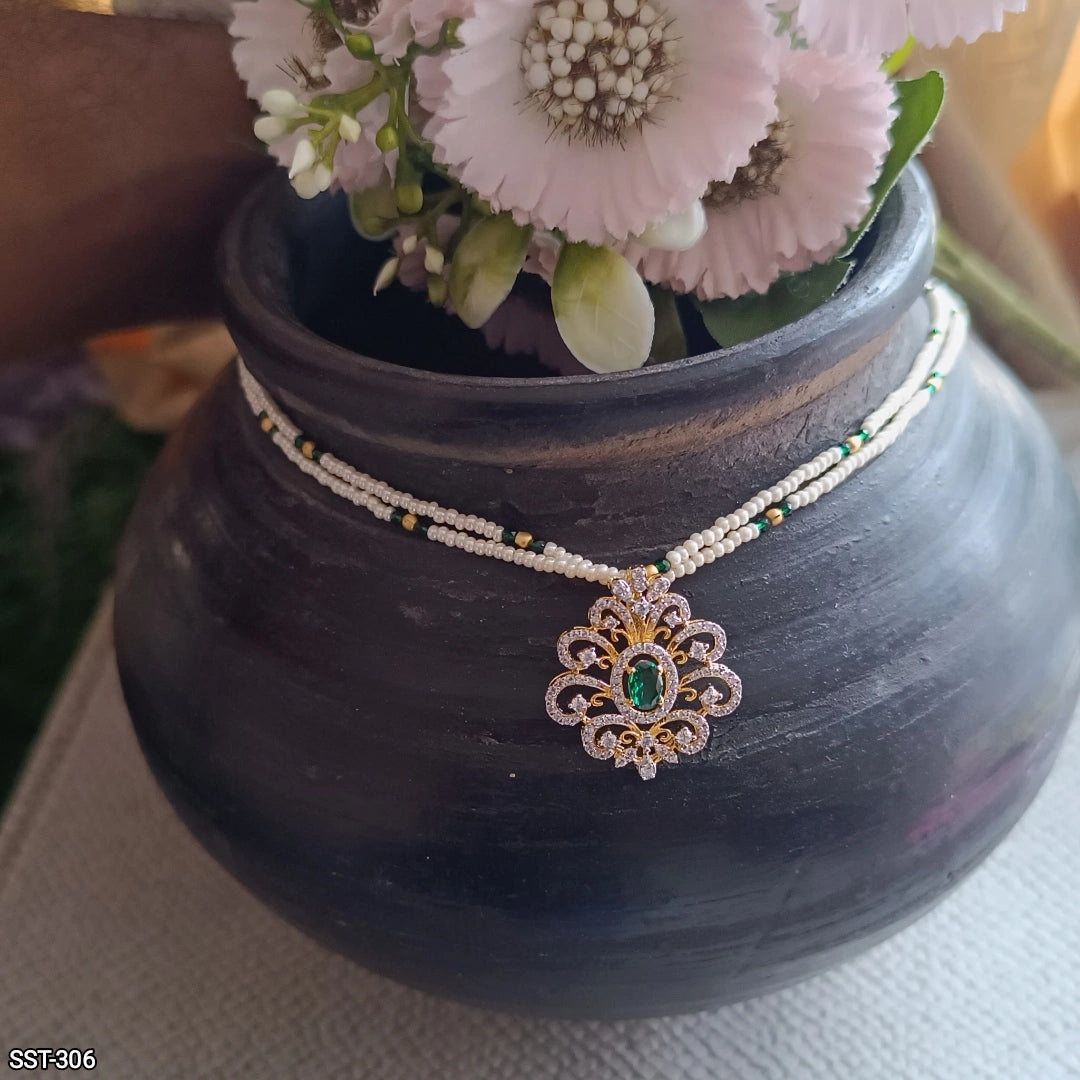 SST 306 |  REGAL PEARL AND EMERALD MANGALSUTRA