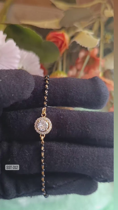 SST 312 | SPARKLING CENTER STONE HAND MANGALSUTRA