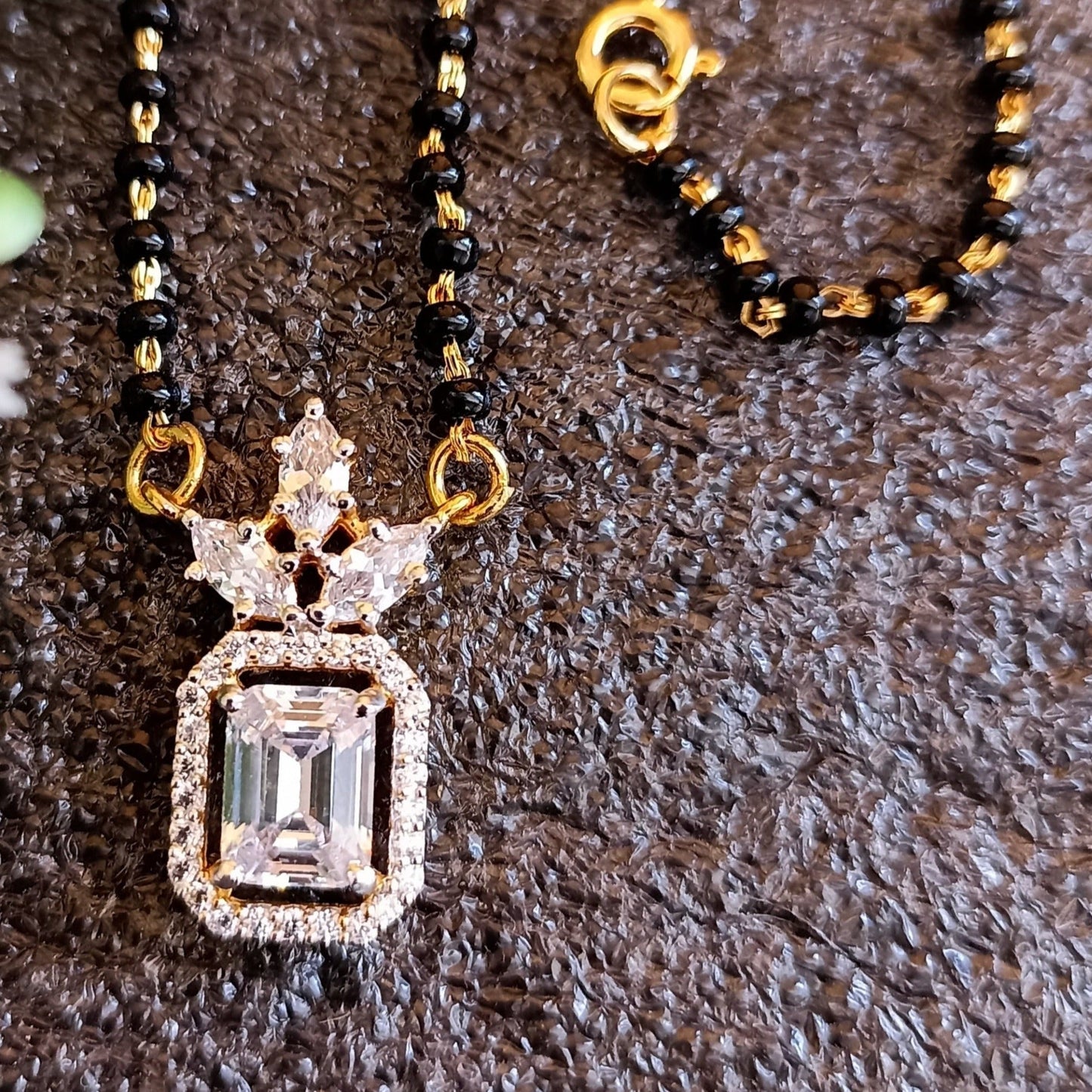 SST 138 | EBONY BLOSSOM MANGALSUTRA WITH DAZZLING PENDANT